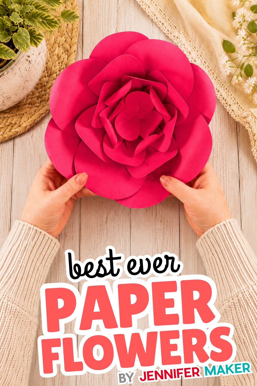 Large dramatic giant paper flowers on a wall